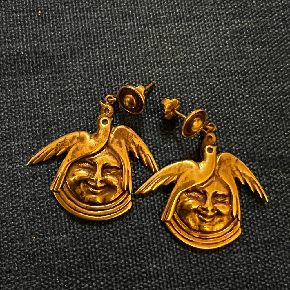 Vintage sterling Mexican earrings — cherub?